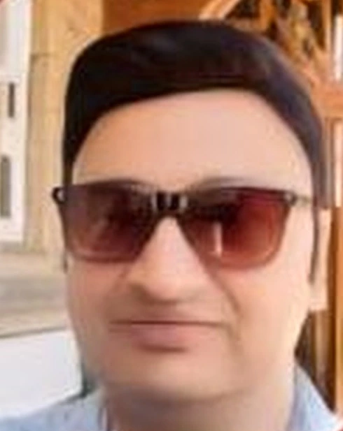 Dr. Dinesh Mehta
